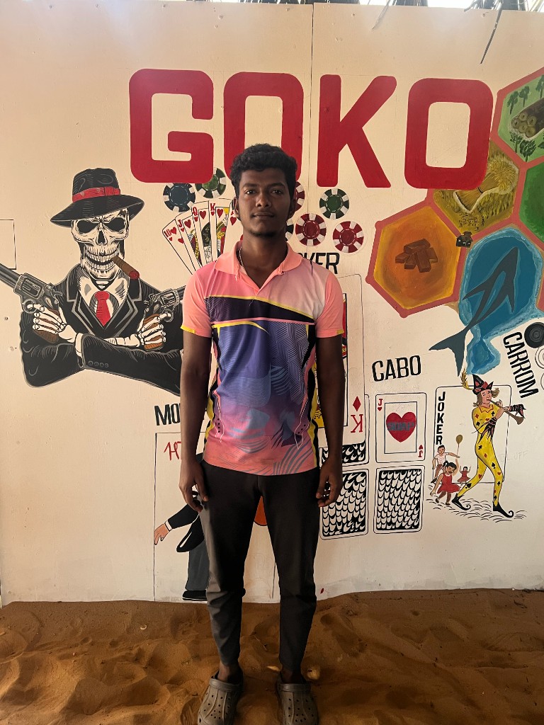 Vijay in front of the GOKO mural